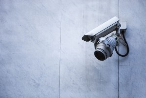 Close-up of CCTV security camera on wall